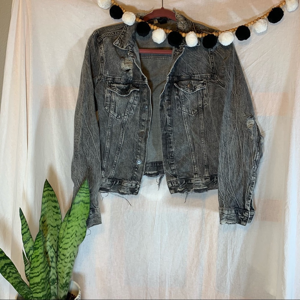 Distressed denim jacket